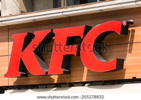 BUCHAREST, ROMANIA - JULY 15, 2014: Kentucky Fried Chicken Restaurant Sign. It is a fast food restaurant chain headquartered in United States specialized in chicken products.