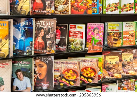 BUCHAREST, ROMANIA - JULY 18, 2014: Food Cooking Books On Modern Bookstore Shelf.