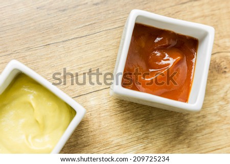 Mustard And Ketchup Sauce In White Bowl