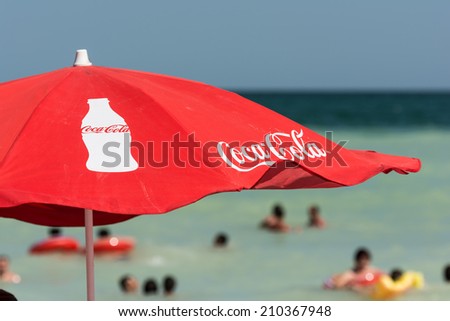 MAMAIA, ROMANIA - JULY 28, 2014: Coca Cola Umbrella On The Black Sea Beach.