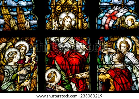CLUJ NAPOCA, ROMANIA - AUGUST 21, 2014: Jesus Christ Resurrection Stained Glass Window Inside The Gothic Roman Catholic Church of Saint Michael Built In 1390.
