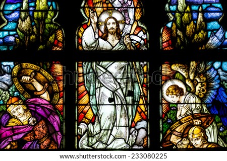 CLUJ NAPOCA, ROMANIA - AUGUST 21, 2014: Jesus Christ Resurrection Stained Glass Window Inside The Gothic Roman Catholic Church of Saint Michael Built In 1390.