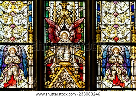 CLUJ NAPOCA, ROMANIA - AUGUST 21, 2014: Angels In Heaven Stained Glass Window Inside The Gothic Roman Catholic Church of Saint Michael Built In 1390.
