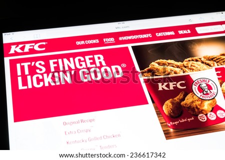 BUCHAREST, ROMANIA - DECEMBER 09, 2014: Kentucky Fried Chicken Website On Apple iPad Air Tablet. Founded in 1930 in The United States is a fast food restaurant chain that specializes in fried chicken.