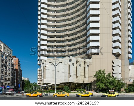 BUCHAREST, ROMANIA - AUGUST 30, 2014: InterContinental Hotel Entrance Downtown Magheru Boulevard. Built In 1970 it is a 25 floors high-rise five star hotel and is also a landmark of the city.