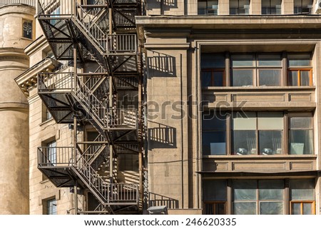 Metal Fire Escape Stairs On Old Building Facade