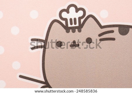BUCHAREST, ROMANIA - JANUARY 31, 2015: Pusheen The Cat Mouse Pad Texture. Pusheen is an animated webcomic series created in 2010 that depicts the life and dreams of the titular gray tabby cat.