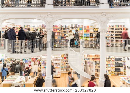 BUCHAREST, ROMANIA - FEBRUARY 13, 2015: People Shopping For Literature Books In Library.