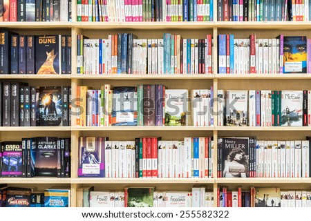 BUCHAREST, ROMANIA - FEBRUARY 25, 2015: Famous Books For Sale On Library Shelf.