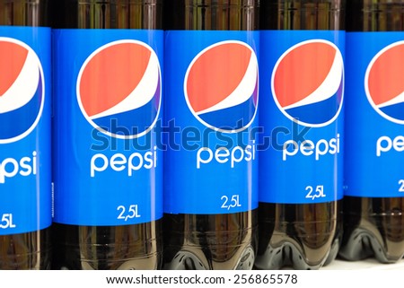 BUCHAREST, ROMANIA - FEBRUARY 22, 2015: Pepsi Cola Bottles On Supermarket Stand.