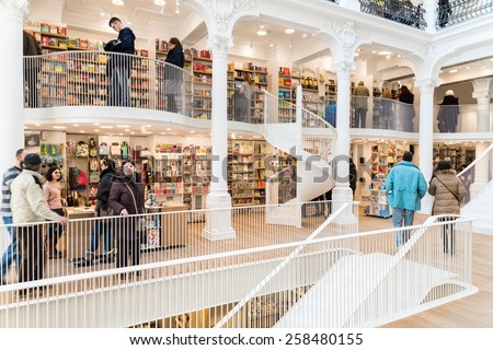 BUCHAREST, ROMANIA - MARCH 05, 2015: People Shopping For Literature Books In Library Mall.