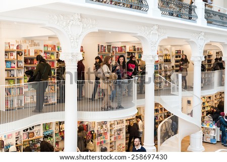 BUCHAREST, ROMANIA - MARCH 07, 2015: People Shopping For Literature Books In Library Mall.