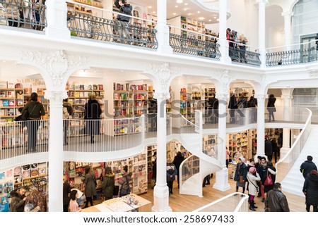 BUCHAREST, ROMANIA - MARCH 07, 2015: People Shopping For Literature Books In Library Mall.
