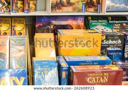 BUCHAREST, ROMANIA - MARCH 22, 2015: Children Board Games For Sale On Library Shelf.