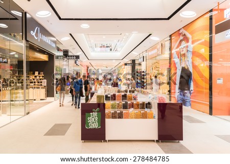 BUCHAREST, ROMANIA - MAY 16, 2015: People Shopping In Luxury Shopping Mall Interior.