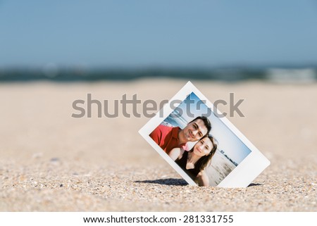 Instant Photo Of Young Happy Boyfriend And Girlfriend Couple On The Beach