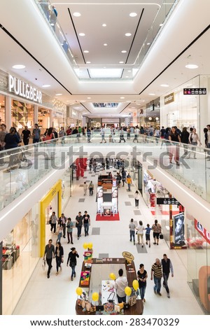 BUCHAREST, ROMANIA - JUNE 02, 2015: People Crowd Shopping In Luxury Mall Interior.