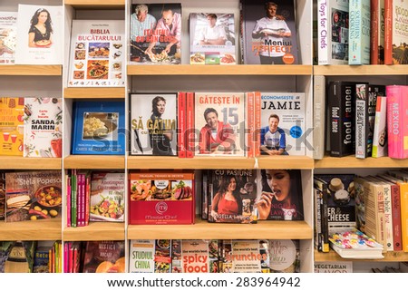 BUCHAREST, ROMANIA - JUNE 03, 2015: Food Cooking Books For Sale On Modern Bookstore Shelf.