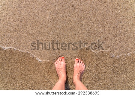 Ocean Sea Waves And Girl Feet On Summer Sand Beach
