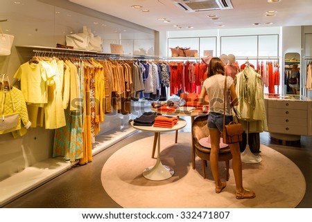 VIENNA, AUSTRIA - AUGUST 20, 2015: Wide Selection Of Woman Clothes In Shopping Mall Store Inside.