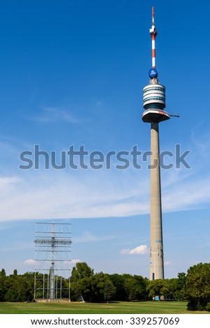 VIENNA, AUSTRIA - AUGUST 20, 2015: The Vienna Donauturm (Danube Tower), opened in April 1964, is the tallest structure in Austria, at 252 metres and among the 75 tallest towers in the world.