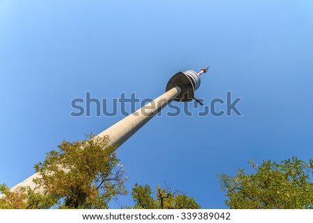 VIENNA, AUSTRIA - AUGUST 20, 2015: The Vienna Donauturm (Danube Tower), opened in April 1964, is the tallest structure in Austria, at 252 metres and among the 75 tallest towers in the world.