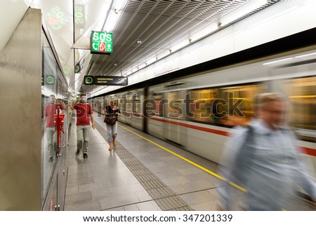 VIENNA, AUSTRIA - AUGUST 25, 2015: People Wait For Train On Subway Station In Downtown Vienna.