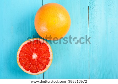Fresh Red Grapefruit Slice On Table