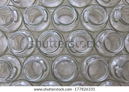 Bottles top view, opened empty clear glass bottles in rows, circles, circles pattern, glass container, opened idea, open to idea, opened human, opened people