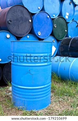 Blue barrels or tanks for oil , gasoline, asphalt, chemical substance. steel contatiner