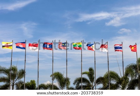 flags of southeast asia countries on blue sky background, AEC, ASEAN Economic Community [ Please see my footage vdo of this photo at www.shutterstock.com/video/video.html?id=7215277 ]