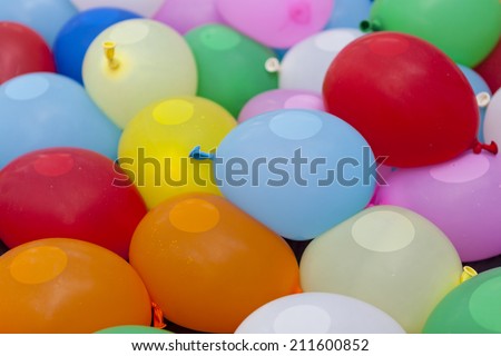 colorful balloons containing water inside for game activity, abstract wallpaper background