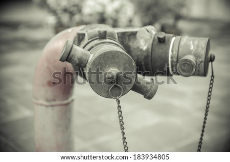 Fire hose connectors dripping water retro style