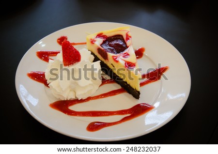 Strawberry cheese cake over white dish