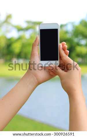 Woman hand smartphone with blank screen