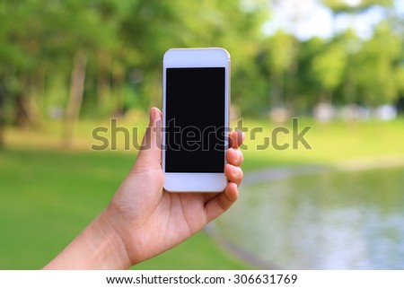 Woman hand smartphone with blank screen