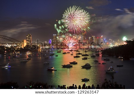 Sydney City Family Firework New Year Eve Celebration Illumination Art Pyrotechnics With Reflection Of Bright Lights In Sydney Harbour Waters