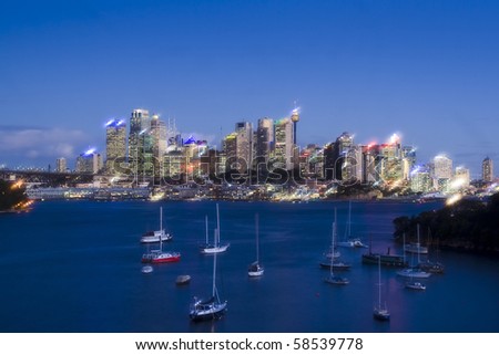 sydney australia CBD night soft effect image harbour bay yachts and skyscrapers highlighted