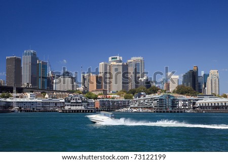 sydney australia harbour view on city CBD the Rocks, skyscrapers and fast running motor boat