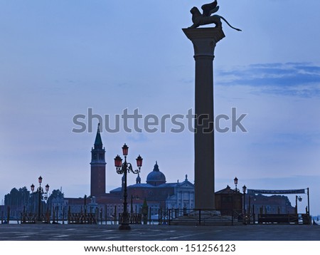 rome venice island city lion on the column arms of coat of venice republic landmark at sunrise pink street lamps san marco square