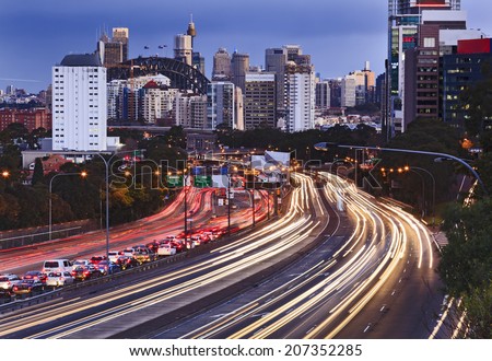 Australia Sydney city CBD close up view along Cahill express motor way rush hour with car congestions and blurred headlights