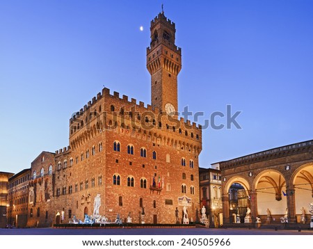 Italy Florence Palazzo Vecchio square at sunrise with moon ancient walls and towers of historic buildings