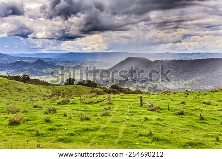 Rural australian agricultural property in barrington tops mountains - the gate in a grass for grazing cattle