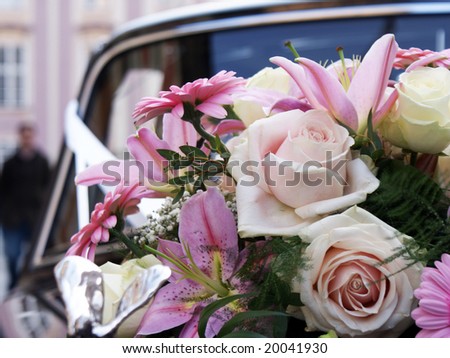 stock photo wedding bouquet on black car