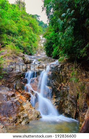 Waterfall in forest of Thailand National Park, in the dry season.