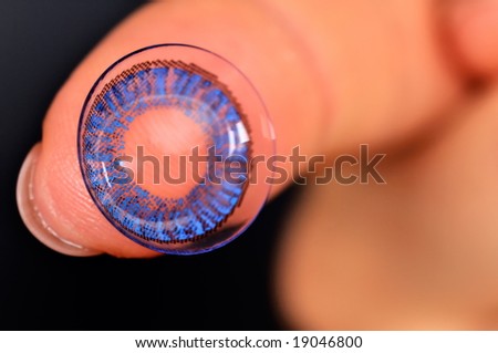 color contact lens on a finger