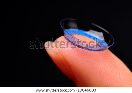 color contact lens on a finger