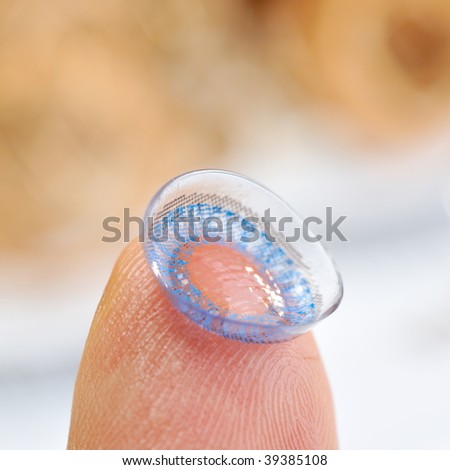 color contact lens on finger