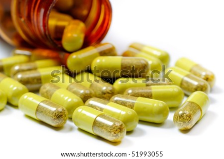 natural pills isolated on white background