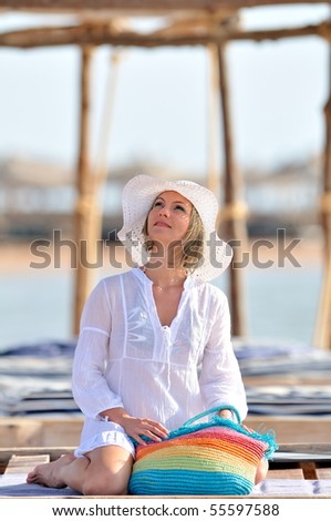 young beautiful woman outdoor in summer